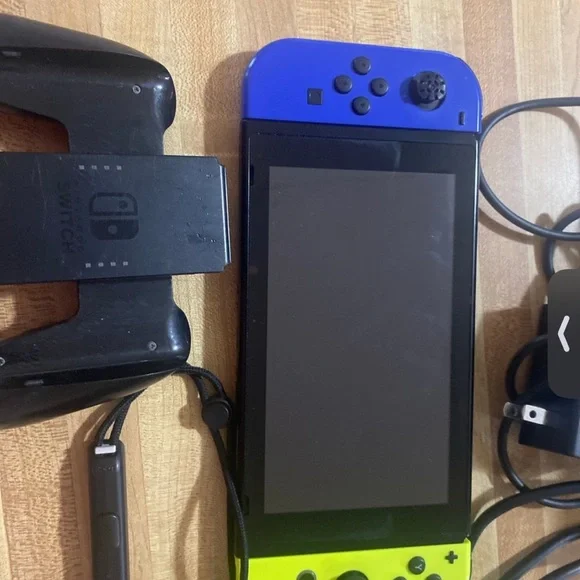 Nintendo Switch with Blue and Yellow Joy-Con Controllers